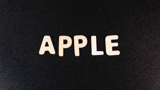 the word apple spelled with white letters on a black background