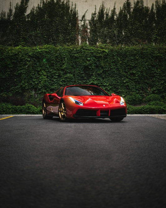 red ferrari 458 italia on road