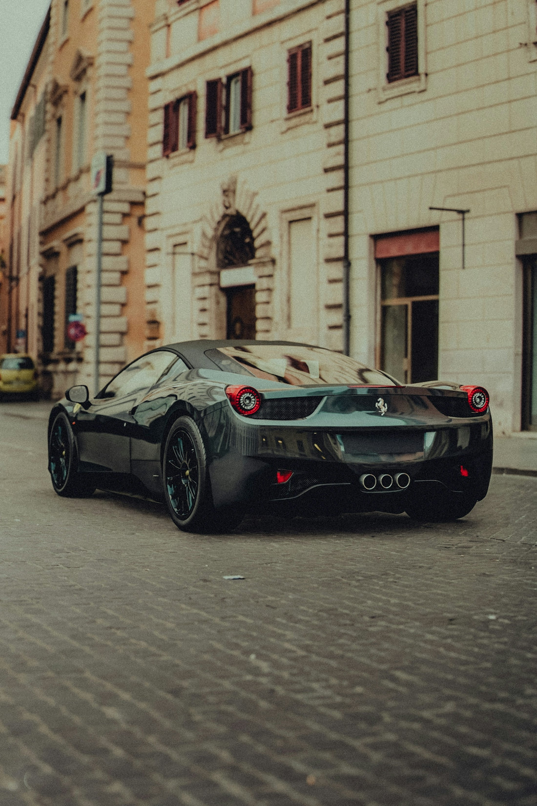 black porsche 911 parked on street during daytime