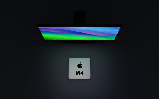 Apple M4 chip and widescreen computer monitor with colorful display on dark background