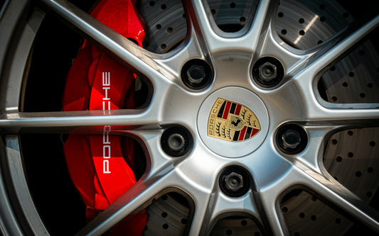 A close up of a wheel on a car