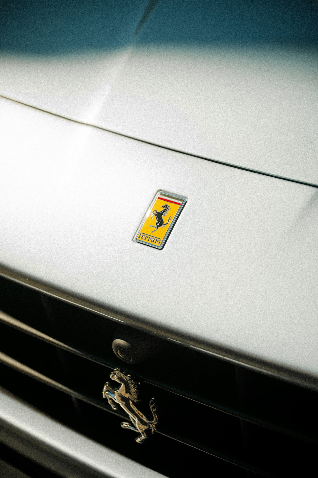 A ferrari badge is displayed on the car's front.