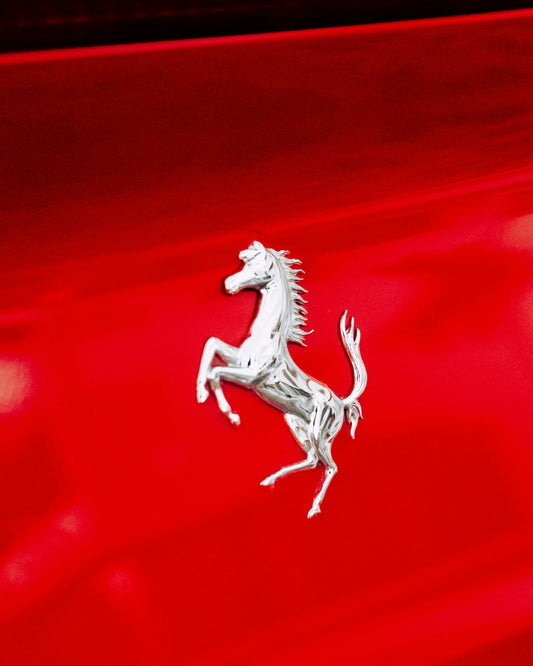 The iconic ferrari prancing horse logo.