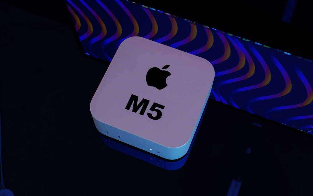 Apple M5 hardware module on a dark reflective surface with colorful background lighting
